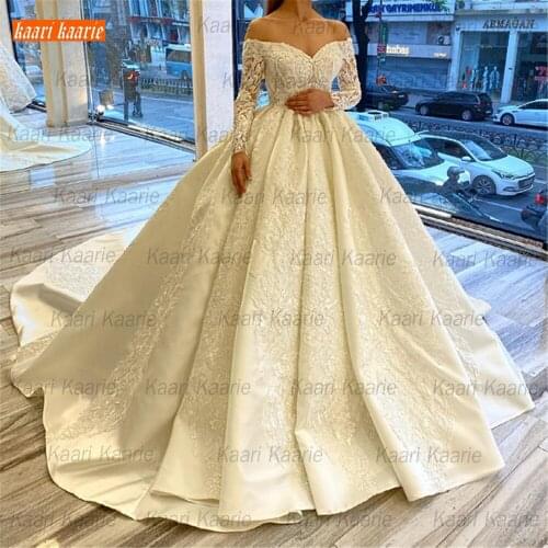 Sexy White Wedding Gown 2021 Lace Appliqued Tulle Bridal Dresses Long Sleeves Satin Robe De Mariee Custom Made Vestido De Noiva
