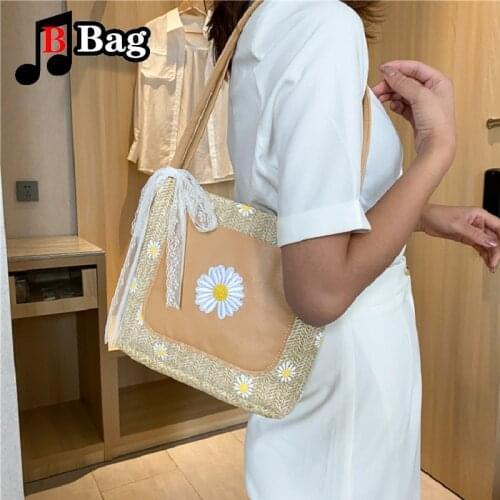 Summer small fresh straw bucket bag womens fashion trend versatile foreign style printing Yuansu simple woven Straw bag