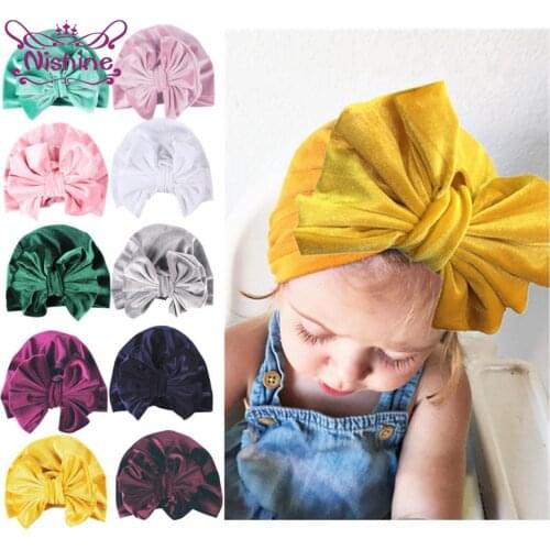Nishine 17.5*13.5 CM Solid Color Bowknot Baby Girls Hats Soft Velvet Beanie Caps for Newborn Children Bows Headwear Kids Gifts