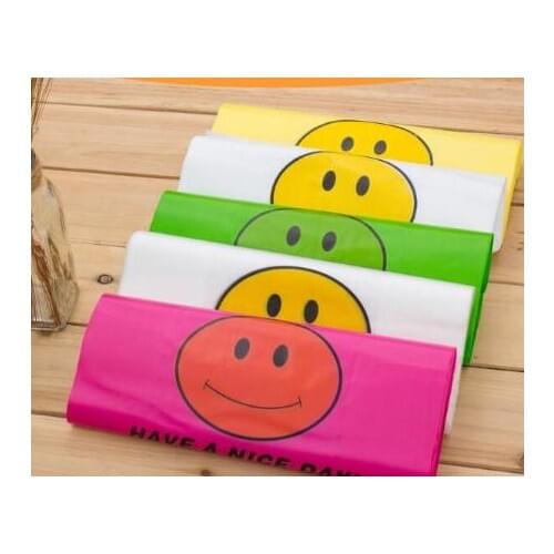 4 sizes 50pcs Supermarket Lovely Smile yellow pink Vest Plastic Carrier Shopping bag with handle plastic Hand Bag Packaging Bag