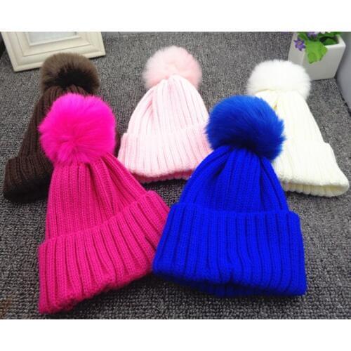 Autumn and winter children thickened candy colored wool ball wool hat Korean version warm ear knitted cap male female baby head
