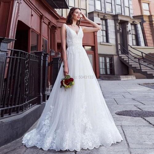 Romantic Lace Applique V Neck A Line Wedding Dresses 2021 Stylish Backless Sweep Train Bridal Gowns Off the Shoulder Bride Dress