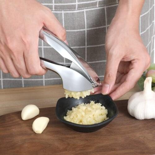 Garlic Press Crusher and Mincer with Sturdy Construction - Professional, Food Grade, Rust proof, Easy Squeeze and Clean