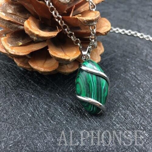 Natural crystal gem mascot betel nut shape pendant jewelry sales in Europe and the Oval pendant aliexpress ebay selling