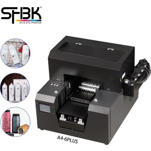 Full Automatic A4 UV printer with cylinder Rotating device. she can print Wine bottle cylindrical object and Flat object printer