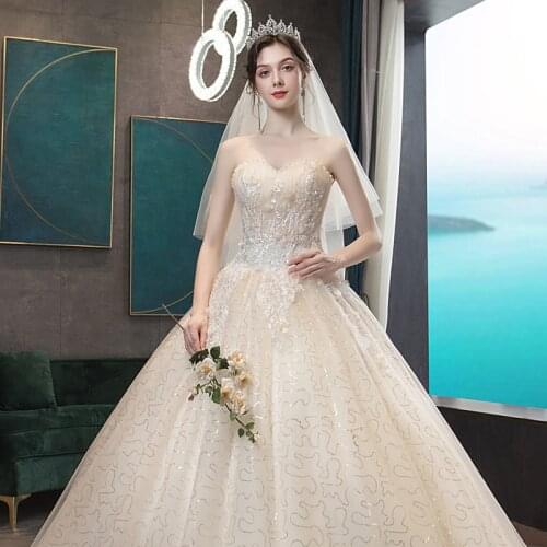 Luxury Champagne Wedding Dresses Sweetheart Lace Appliques Sequined Beading Strapless Sexy Princess White Bride Gowns New 2021