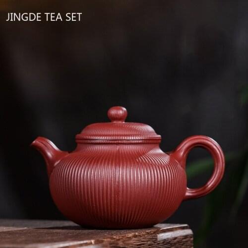 Chinese Yixing tea pots Purple Clay Boutique stripe Teapot Handmade beauty kettle Tie Guanyin Puer Tea set Drinkware 310ml