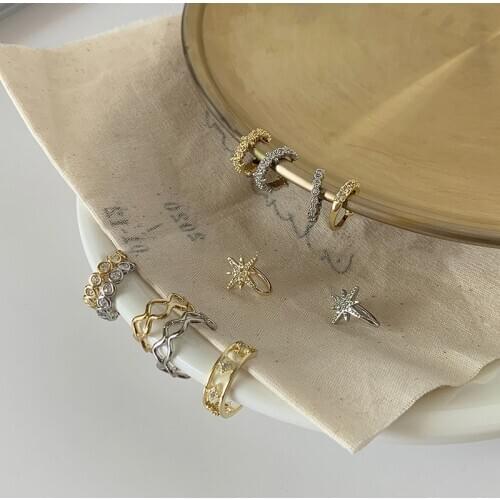Minimalist Bling Rhinestones Star Twisted Clip Earrings for Women Girls Gold Color Metal Hollow Charm Statement Earrings Jewelry