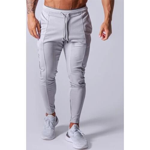 2021 new muscle fitness running training sports cotton trousers mens breathable Slim beam mouth casual health pants