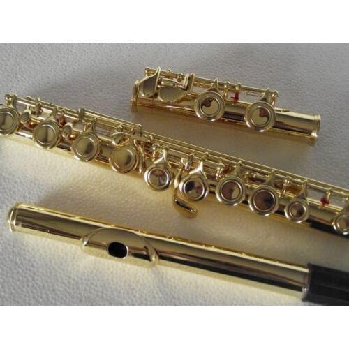 Brand new Gold plated 16 key closed hole flute C tune +E key