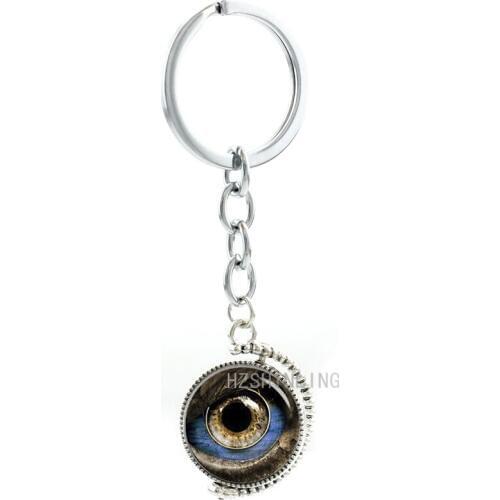 Double sides rotatable Eagle Eye pendant keychain men women cool glass cabochon seagle eyes key chain ring holder jewelry T377