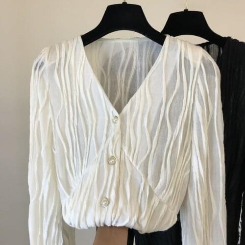 2020 spring and autumn new Korean version ins specific novel pleated material loose wild V-neck shirt pleated top women