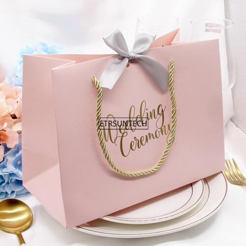 100Pcs High-quality gifts Bow gift bag Portable paper bag Wedding supplies Tote bag wrapping paper bags with handle 3 Colors