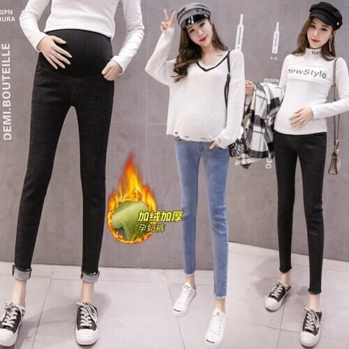 Pregnant women plus velvet jeans winter thickened belly lift pants trendy moms fashion all-match stretch thin pants