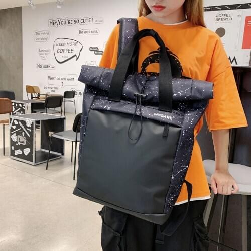 The new Korean version of the contrast color bucket backpack mens casual campus student backpack schoolbag backpack women