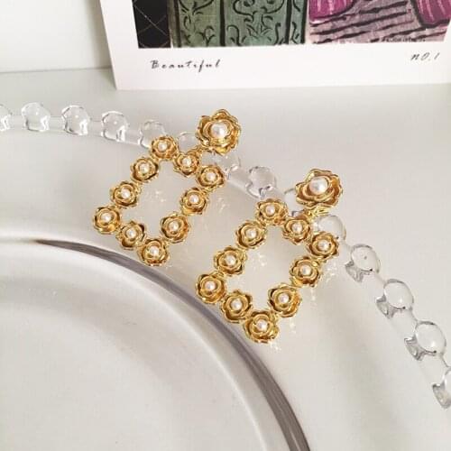 Ins retro camellia flower temperament pearl earrings new French style niche design geometric earrings earrings high sense