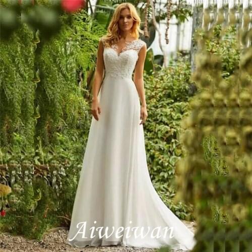 A-Line Wedding Dresses V Neck Sweep/Brush Train Chiffon Regular Straps Beach Boho Illusion Detail Backless with Lace Insert 2021