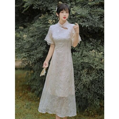 SWEETXUE Retro Temperament Improved Cheongsam Embroidered Tassel Hollow Trumpet Sleeve Romantic Party Dress Qipao Vestidos