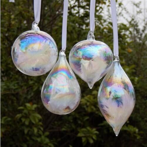 Christmas decorations, colorful glass filled with feather balls, wedding decorations