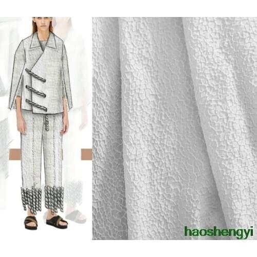 High quality white honeycomb irregular rock three-dimensional jacquard texture texture clothing fabric