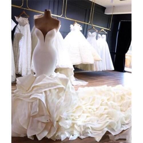 2020 New Luxurious Plus Size Mermaid Wedding Dresses Sweetheart Sleeveless Backless Satin Tiered Ruffle Cathedral Train Formal B