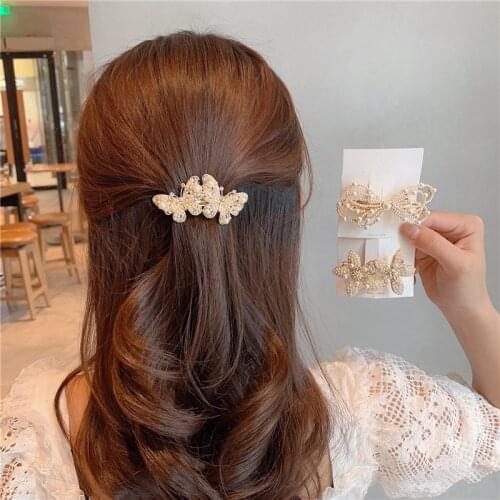 The New Pearl Rhinestone Hair Clip Flower Alloy Hairgrips Boutique Fashion Wild Hair Accessories Women Sweet Barrettes Butterfly