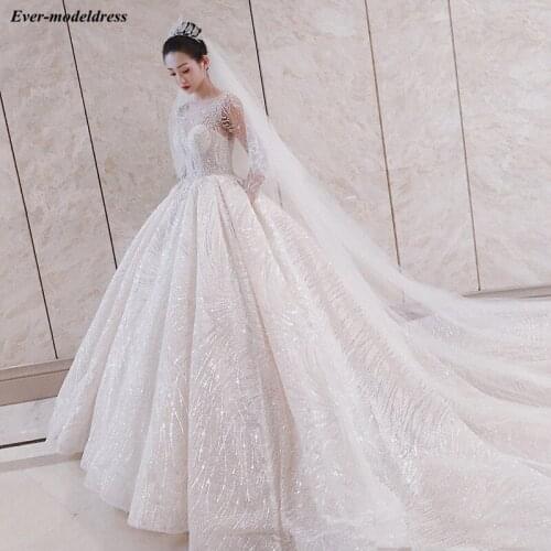 Luxury Sparkly Ball Gown Wedding Dress Long Sleeve Sequins Crystal Lace Up Back Bride Dress Robe De Mariee 2021 Vestido De Noiva