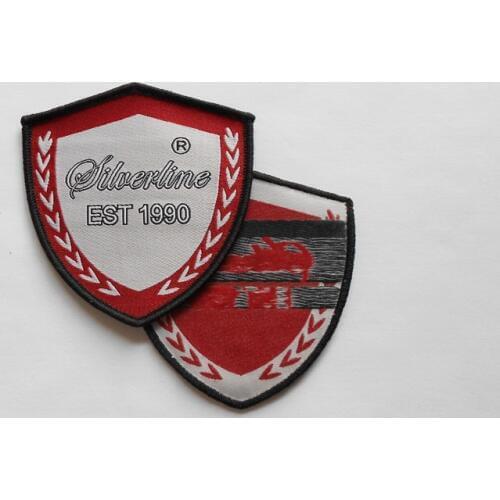 Sports team shield garment iron on woven badges, customized stitched merrow border patch with brand logo for Africa schools