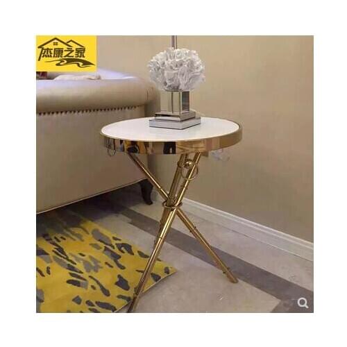 A few marble small coffee tables in the corner of the living room sofa are creative living room household simple stainless steel