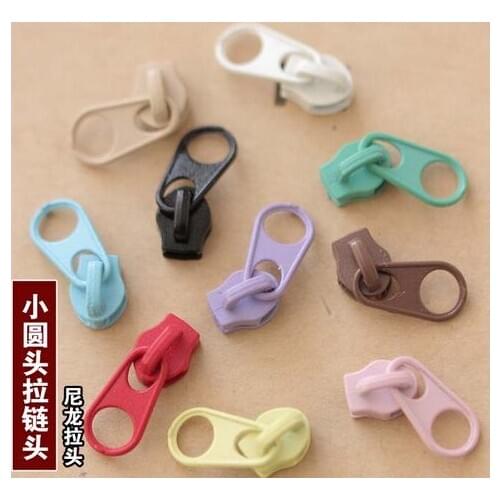 Free shipping 100pcs/lot 3# small round head nylon metal zipper head pendant diy accessories bags zip head decoration accessory