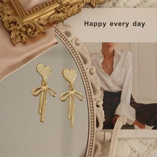 Silver Needle French Palace Style Pearl Love Bowknot Temperament Net Red Earrings Niche Design Earrings Female fashion jewelry