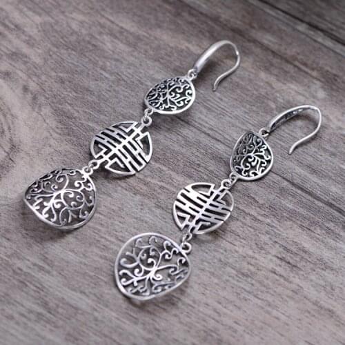 KJJEAXCMY fine jewelry S925 sterling silver ornament hollow-out decorative pattern name feng shuangxi ladies earrings