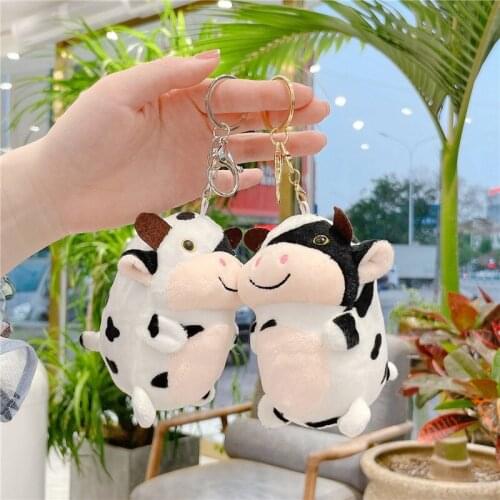 10cm Mini kawaii cute little cow plush pendant bag key accessories Villus toy black and white spotted cow fun car accessories