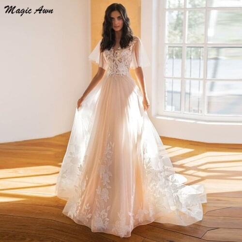 Magic Awn Graceful Champagne Wedding Dresses Boho Lace Appliques Illusion Cap Sleeves Princess Beach A-Line Mariage Gowns 2021
