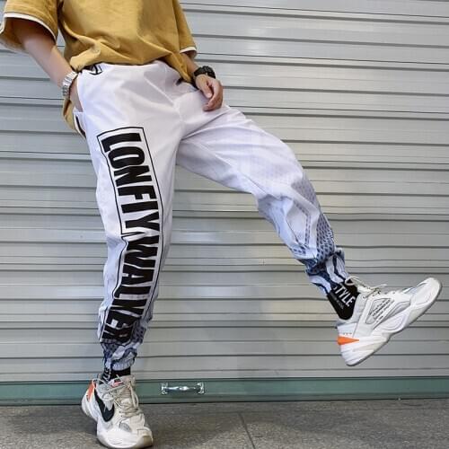 Wholesale 2021 mens summer teenager Korean Gradient casual trousers mens sports loose youth beam foot Harem ankle length pants