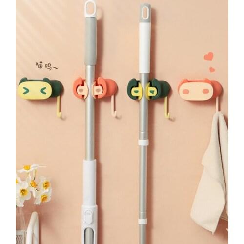 Perforation-free wall hanging toilet storage rack compression bearing adhesive strong fixed buckle broom mop hook J05