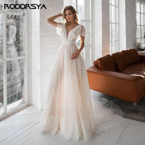 2020 Cap Sleeve Boho Wedding Dresses Lace Appliques Champagne Dot Tulle Bride Gowns V-neck Backless Beach Wedding Party Gowns