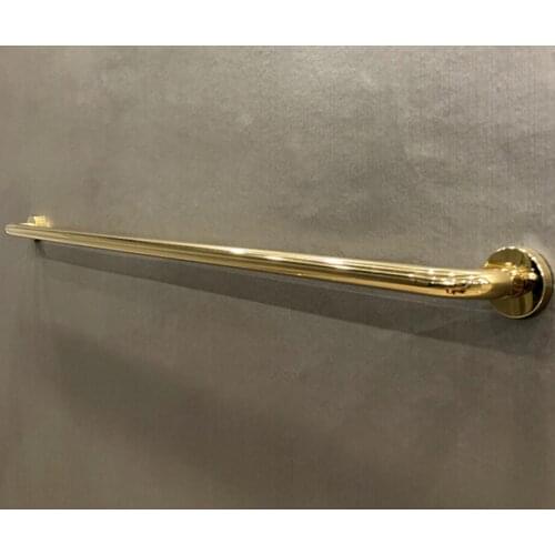 Clothing store gold is hanging on the wall shelf display shelf wall hanging yellow titanium gold clothes rack round tube hanging