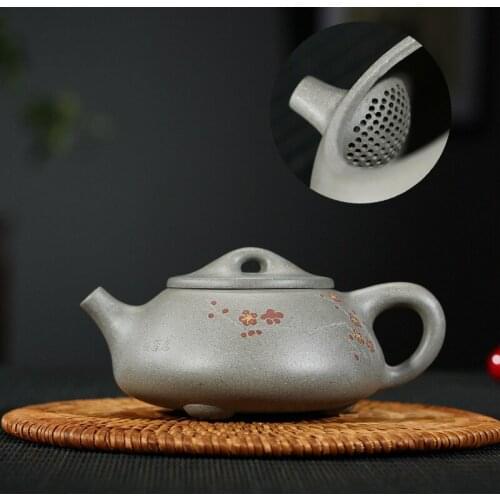 Wholesale undressed ore its engraved paint with the ball hole JingZhou mud stone gourd ladle pot special tea sells
