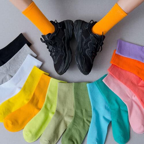 Spring autumn solid color socks womens tube thin fluorescent socks street hip-hop wild black cotton socks Candy colors
