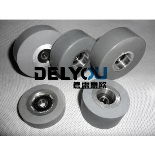 Woodworking machine accessories' east edge Huali dragon edge smooth wheel roller conveying pressure