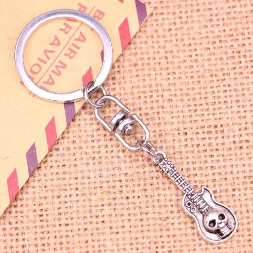 New Fashion Keychain 32x11mm guitar skull Pendants DIY Men Jewelry Car Key Chain Ring Holder Souvenir For Gift