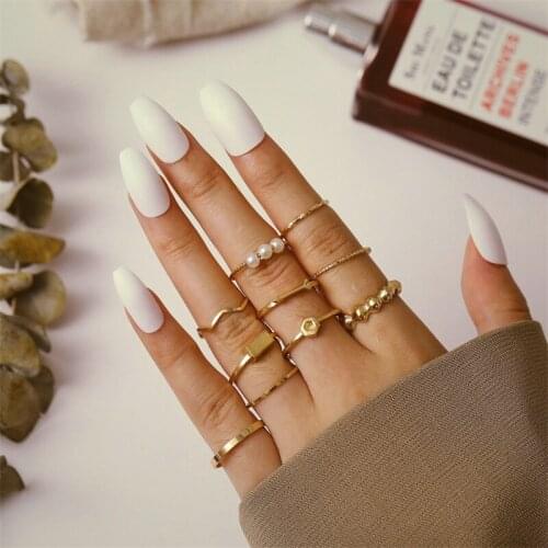 Wind new alloy open ring 10 Piece Set personality suit pearl ring index finger joint tail ring