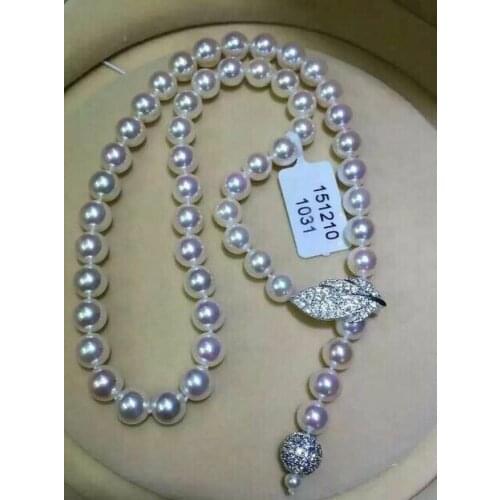 Single strand 9-10 mm round white pearl necklace 28"