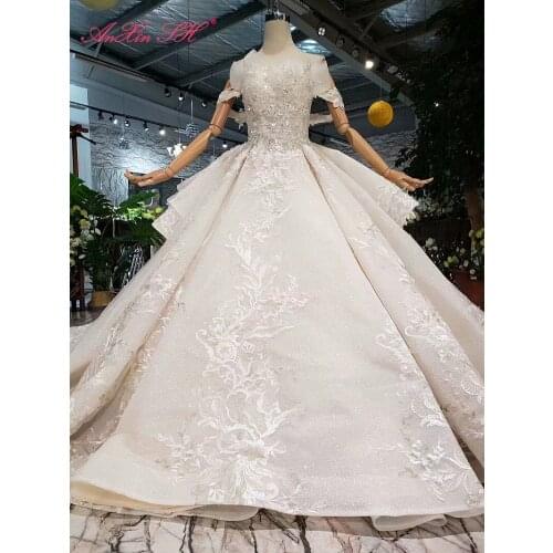 AnXin SH Luxury princess white flower lace beading crystal illusion boat neck ruffles lace up wedding dress 100% real photo