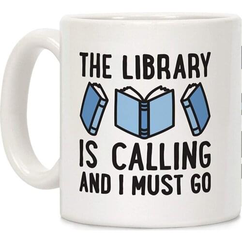 The Library Is Calling And I Must Go White 11 Ounce Ceramic Coffee Mug