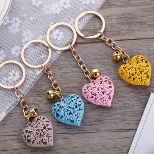 Stylish Unisex Hollow out Heart Bell Pendant Key Ring Bag Jeans Hanging Ornament or ladies bags and cars key chains