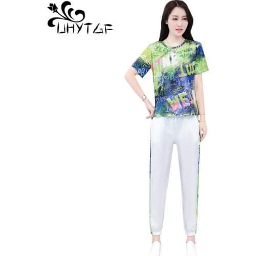 UHYTGF women sets fashion printing ice silk summer tracksuit for women short sleeve t-shirt tops+pants elegant two piece set 957