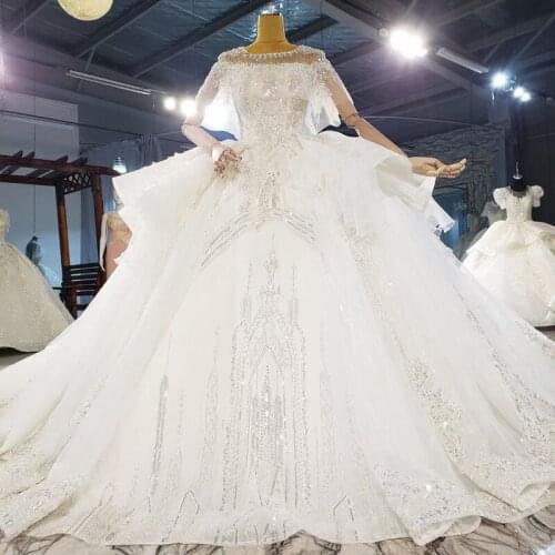 Glamorous 2021 Crystals Sheer Lace Two Pieces Cape And Dresses Jacket Wedding Dresses Long Sleeve Custom Made Bridal Party Gowns