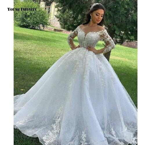 Amazing Ball Gown Wedding Dresses 2021 Long Sleeves Bridal Gown Illusion Back Scoop Chapel Train Beading White Plus Size Bride